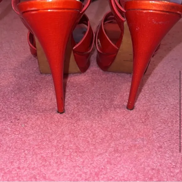 Authentic YSL fire red pumps