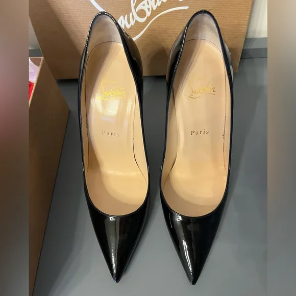 Black patent leather Louboutin Decollette pumps