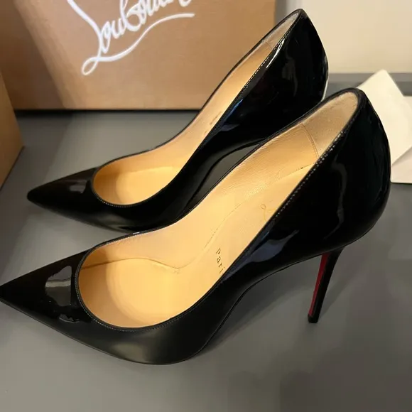 Black patent leather Louboutin Decollette pumps