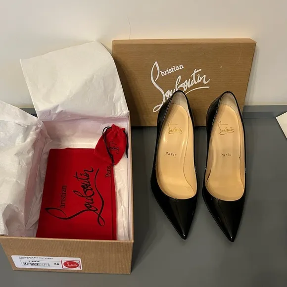 Black patent leather Louboutin Decollette pumps