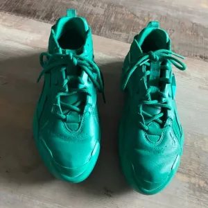 Cardi B green sneakers