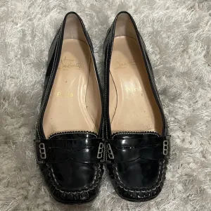 Christian Louboutin Black Flats Timeless Elegance