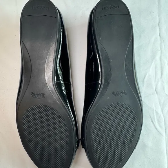 Coach Oswald Black Patent Leather Flats with Gunmetal Bar Accent