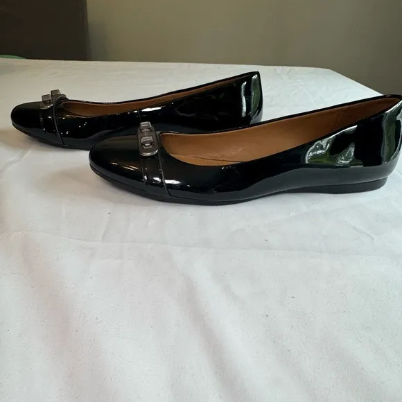 Coach Oswald Black Patent Leather Flats with Gunmetal Bar Accent