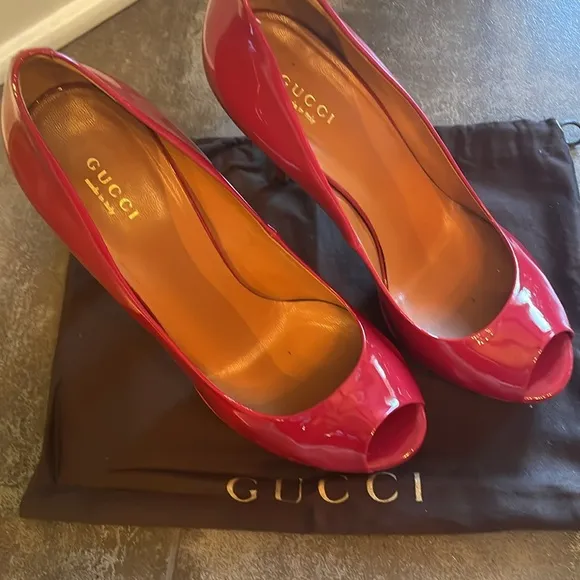 Gucci women’s peep toe pumps