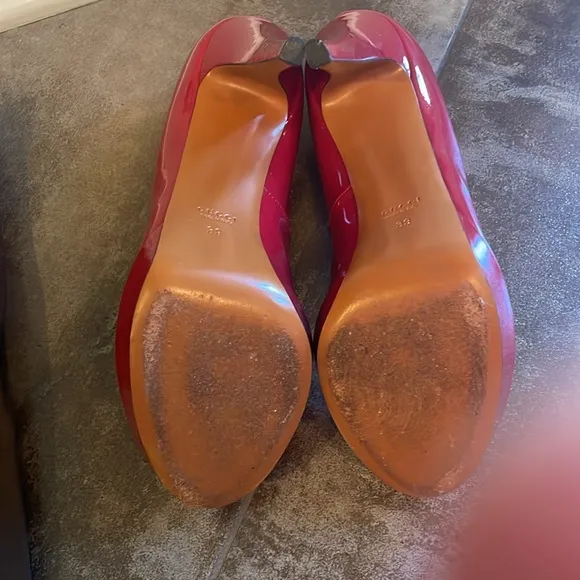 Gucci women’s peep toe pumps