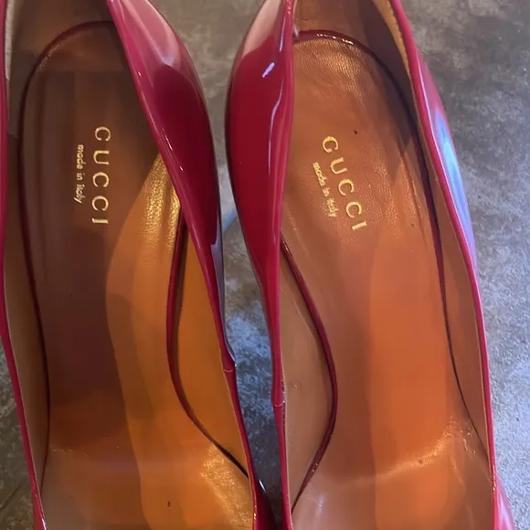 Gucci women’s peep toe pumps