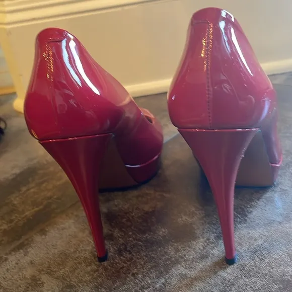Gucci women’s peep toe pumps