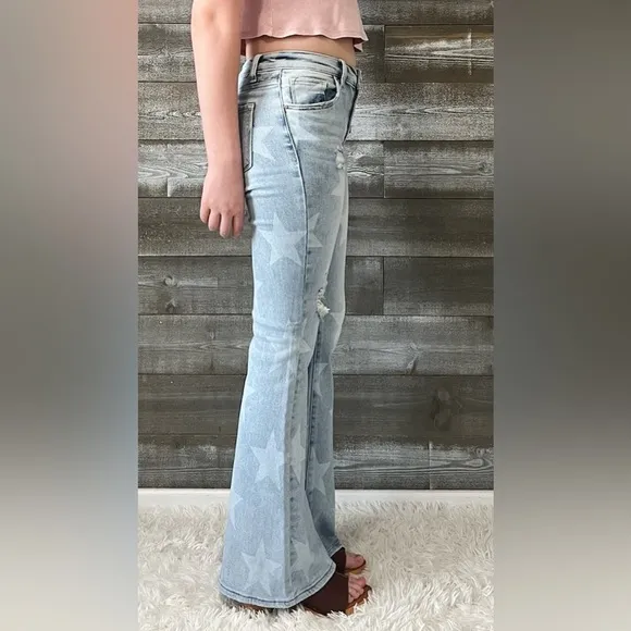 HOT risen mid rise star print flare jeans