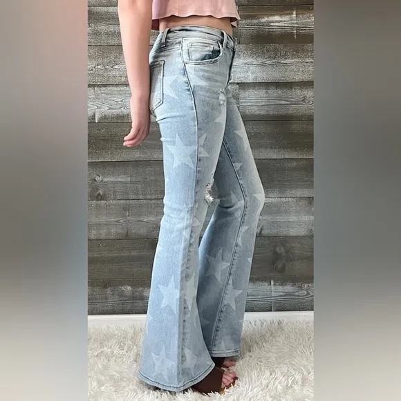 HOT risen mid rise star print flare jeans