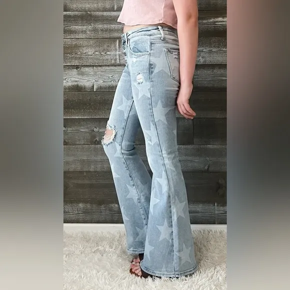HOT risen mid rise star print flare jeans