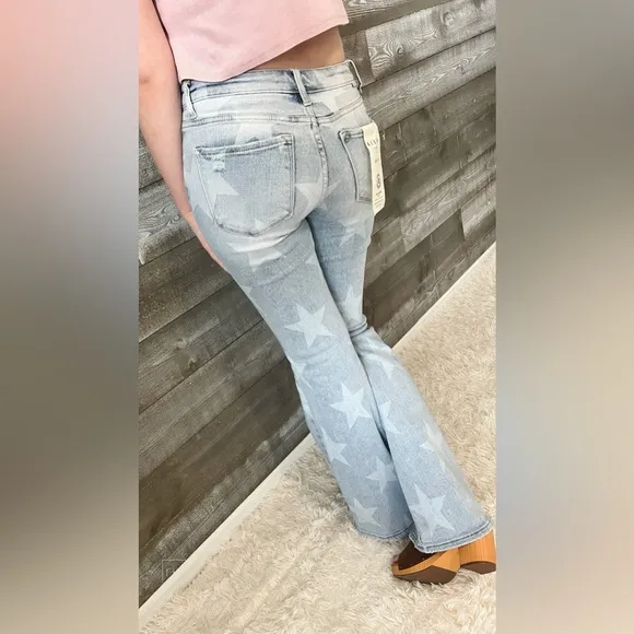 HOT risen mid rise star print flare jeans