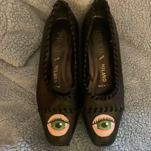 Lover’s Eye Prada Pumps